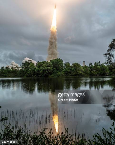 In this handout image provided by the U.S. National Aeronatics and Space Administration , Arianespace's Ariane 5 rocket launches with NASA's James...