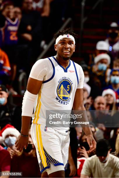 Kevon Looney of the Golden State Warriors looks on during the game against the Phoenix Suns on DECEMBER 25, 2021 at Footprint Center in Phoenix,...