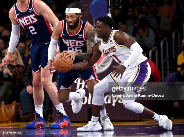 DeAndre' Bembry of the Brooklyn Nets steals the ball from Kendrick Nunn of the Los Angeles Lakers in the first half of the game at Crypto.com Arena...