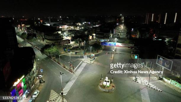 Aerial photo taken on Dec. 25, 2021 shows a view of deserted roads during the night curfew in Bhopal, the capital city of India's Madhya Pradesh...