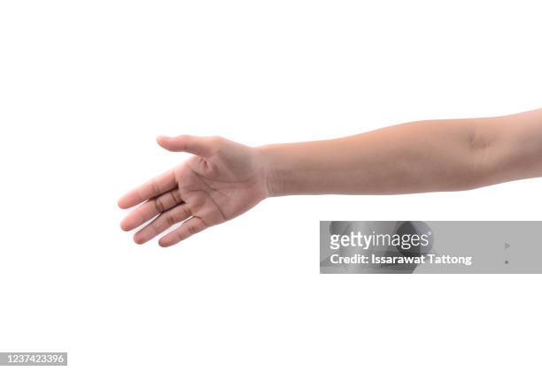 woman stretching hand to handshake isolated on a white background. woman hand ready for handshaking - braccio umano foto e immagini stock