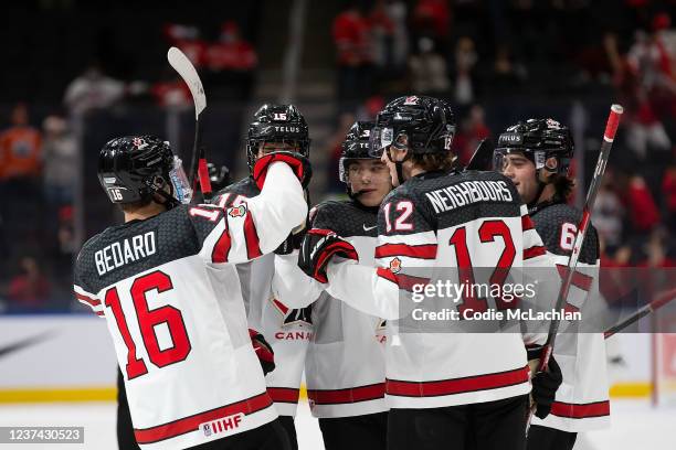 Connor Bedard, Shane Wright, Olen Zellweger, Jake Neighbours and Lukas Cormier of Canada celebrate a goal against Czechia in the third period during...
