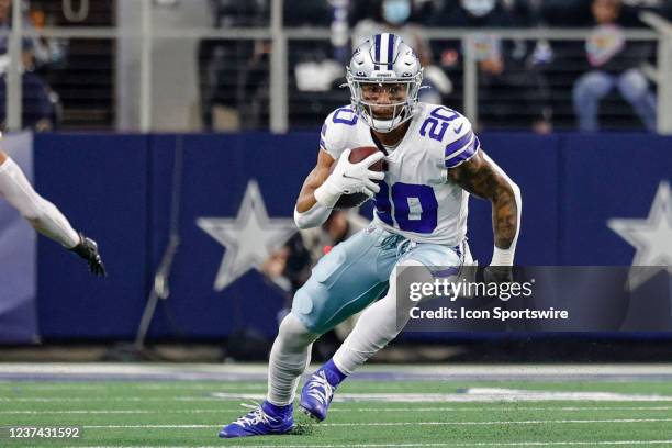 Dallas Cowboys running back Tony Pollard runs for a first down during the game between the Dallas Cowboys and the Washington Football Team on...