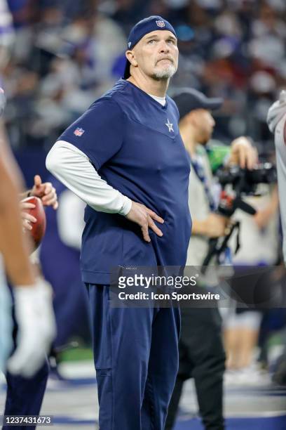 Dallas Cowboys defensive coordinator Dan Quinn watches during warm-ups during the game between the Dallas Cowboys and the Washington Football Team on...