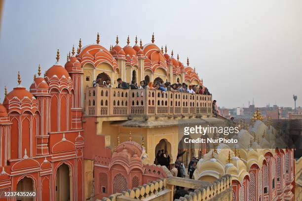 Tourists visit historical Hawa Mahal during the winter holidays , in Jaipur , Rajasthan, India , Monday, Dec 27,2021.