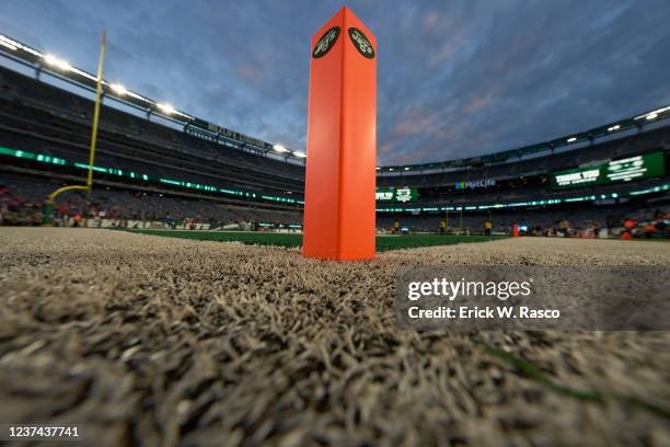 View of orange pylon with New York Jets logo on field at end zone before game vs Buffalo Bills at MetLife Stadium. Equipment. East Rutherford, NJ...