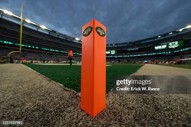 View of orange pylon with New York Jets logo on field at end zone before game vs Buffalo Bills at MetLife Stadium. Equipment. East Rutherford, NJ...