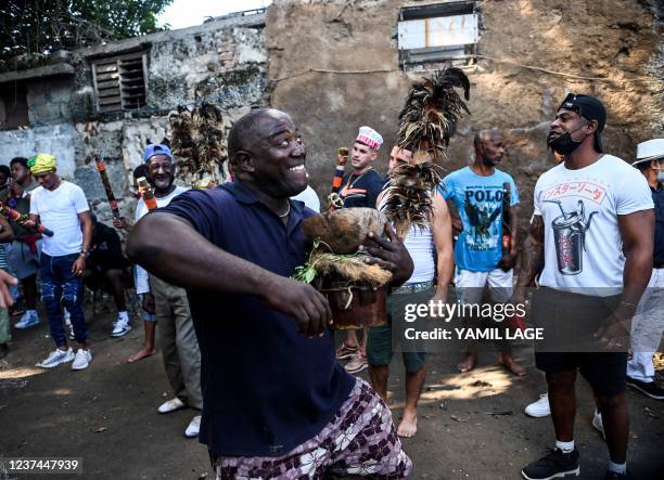 Member of the men's religious secret society known as Abakua dances during a ceremony of the Efi Barondi Cama "potency" in Simpson neighbourhood, in...