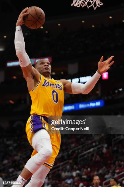 Russell Westbrook of the Los Angeles Lakers dunks the ball during the game against the Houston Rockets on December 28, 2021 at the Toyota Center in...
