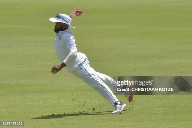 South Africa's Temba Bavuma fields during the fourth day of the first Test cricket match between South Africa and India at SuperSport Park in...