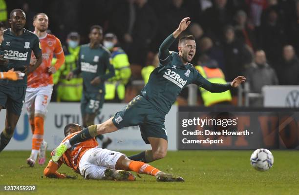 Middlesbrough's Andraz Sporar is tackled by Blackpool's Keshi Anderson during the Sky Bet Championship match between Blackpool and Middlesbrough at...