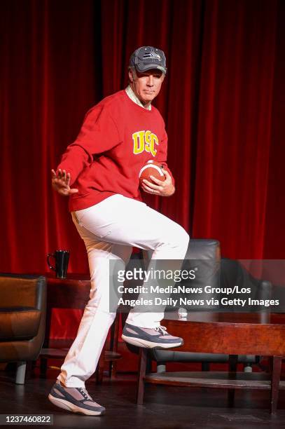 Los Angeles, CA Comedian Will Farrell strikes a heisman pose at USC Wednesday, February 26, 2014.