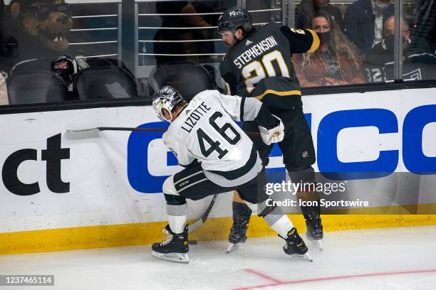 Los Angeles Kings Center Blake Lizotte and Vegas Golden Knights Center Chandler Stephenson battle for the puck during a Los Angeles Kings game versus...