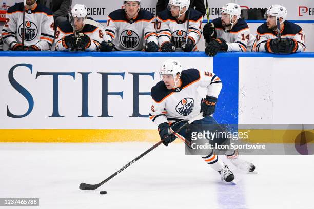 Edmonton Oilers defenseman Cody Ceci turns and skates the puck up ice during a game between the Edmonton Oilers and the St. Louis Blues on December...