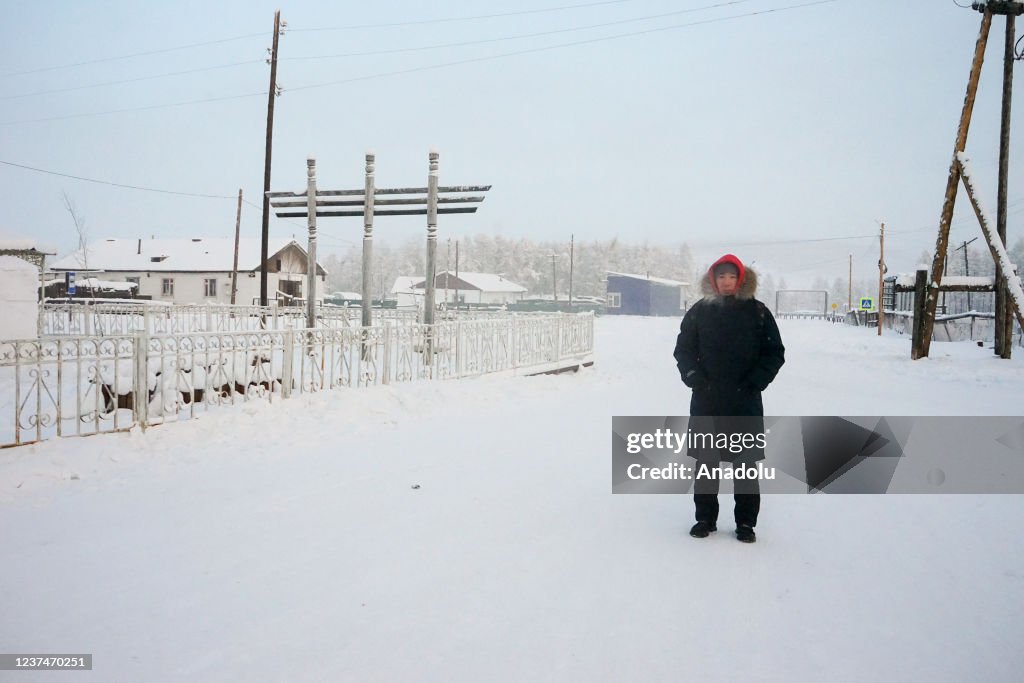 Weather In Russia A man wears thick clothes as temperature dropped to 60 Celsius... News ...