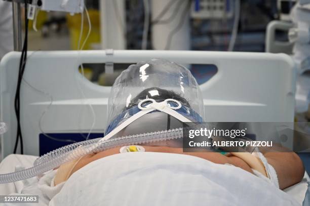 Patient uses a new non-invasive technology that can reduce the need of intubation at Covid-19 intensive care unit at The Institute of Clinical...