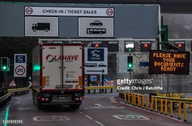 Lorries and heavy goods vehicles make their way into the Port of Dover on December 30, 2021 in Dover, England. Businesses importing products of...