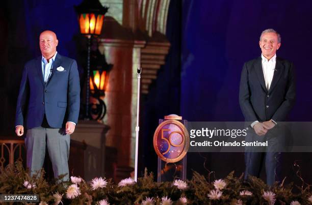 Disney Co. Executives CEO Bob Chapek, left, and Bob Iger, executive chairman, deliver remarks at Cinderella Castle at the Magic Kingdom during the...