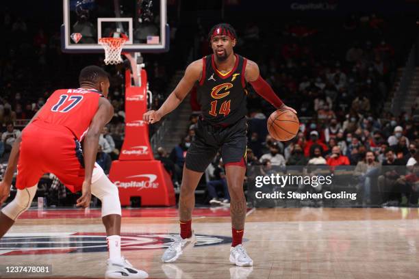 Malik Newman of the Cleveland Cavaliers handles the ball during the game against the Washington Wizards on December 30, 2021 at Capital One Arena in...