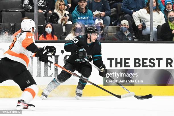 Matt Nieto of the San Jose Sharks skates with the puck against the Philadelphia Flyers in a regular season game at SAP Center on December 30, 2021 in...