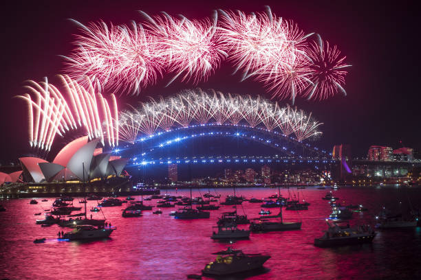 AUS: New Year's Eve Celebrations In Sydney As Omicron Explosion Damps Australia's New Year Festivities