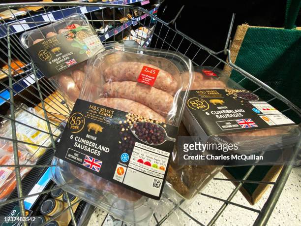Mainland chilled meats produce can be seen in a supermarket shopping basket on December 31, 2021 in Larne, Northern Ireland. The grace period for the...