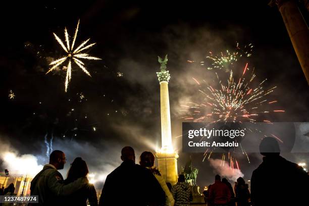 Fireworks light up the night sky over Heroes Square within the new year celebrations in Budapest, Hungary on January 01, 2021.