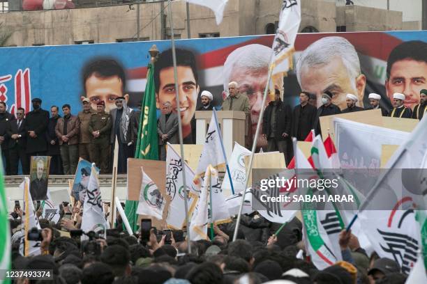 Head of Iraq's al-Hashed al-Shaabi ex-paramilitary alliance Faleh Al-Fayyadh, addresses the crowd as PMF members and supporters hold a rally and a...