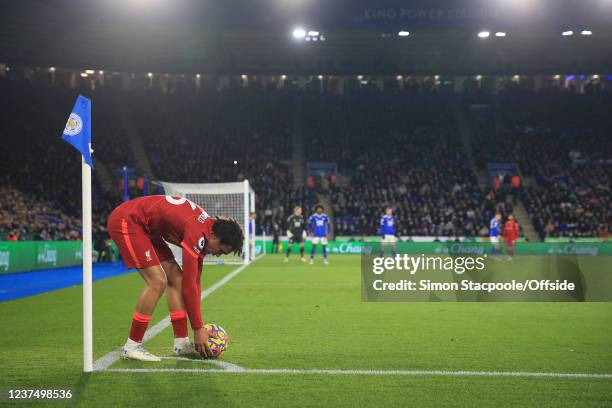 Trent Alexander-Arnold of Liverpool places the ball before taking a corner during the Premier League match between Leicester City and Liverpool at...