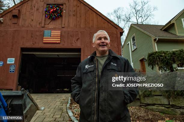 Jim Wood, an Air Force Veteran and member of the New Hampshire voter integrity group, speaks to reporters standing in front of his barn in Merrimack,...