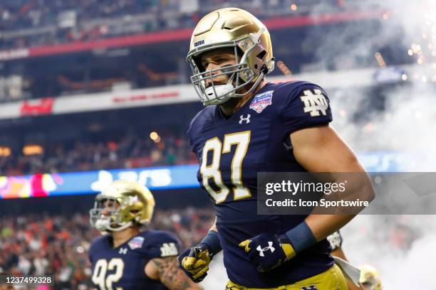 Notre Dame tight end Michael Mayer runs onto the field prior to the PlayStation Fiesta Bowl between the Notre Dame Fighting Irish and the Oklahoma...