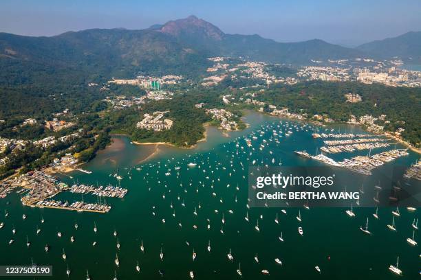 This aerial photo shows yachts moored at the Hebe Haven Yacht Club in Hong Kongs Sai Kung area on January 2, 2022.