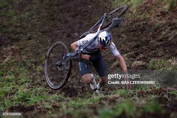 First-placed Britain's Thomas Pidcock competes in the men Elite race round of 13 of the cyclo-cross World Cup in Hulst, on January 2, 2022. - -...