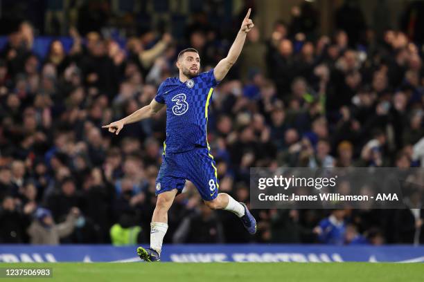 Mateo Kovacic of Chelsea celebrates after scoring a goal to make it 1-2 during the Premier League match between Chelsea and Liverpool at Stamford...