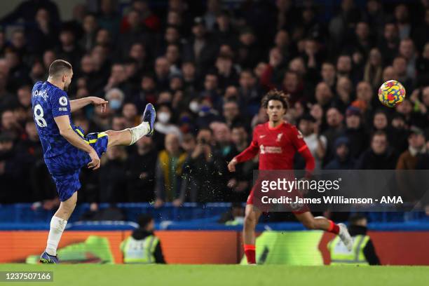 Mateo Kovacic of Chelsea scores a goal to make it 1-2 during the Premier League match between Chelsea and Liverpool at Stamford Bridge on January 2,...