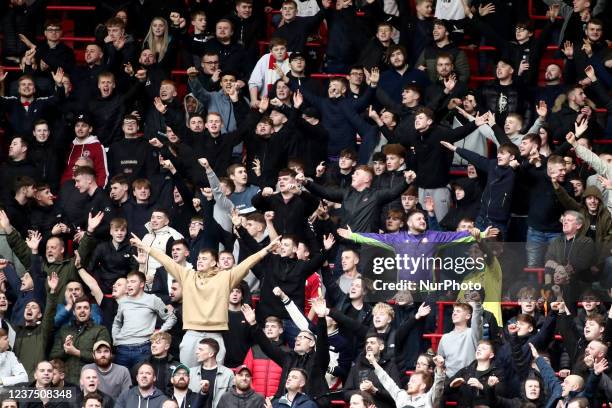 Bristol City fans celebrate after Andreas Weimann of Bristol City opens the scoring during the Sky Bet Championship match between Bristol City and...