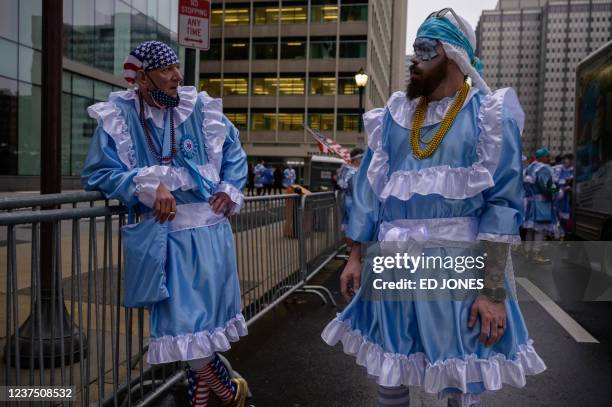 Revellers in fancy dress participate in the annual Mummers Parade in Philadelphia on January 2, 2022. - The Mummers Parade is a 120-year-old folk...