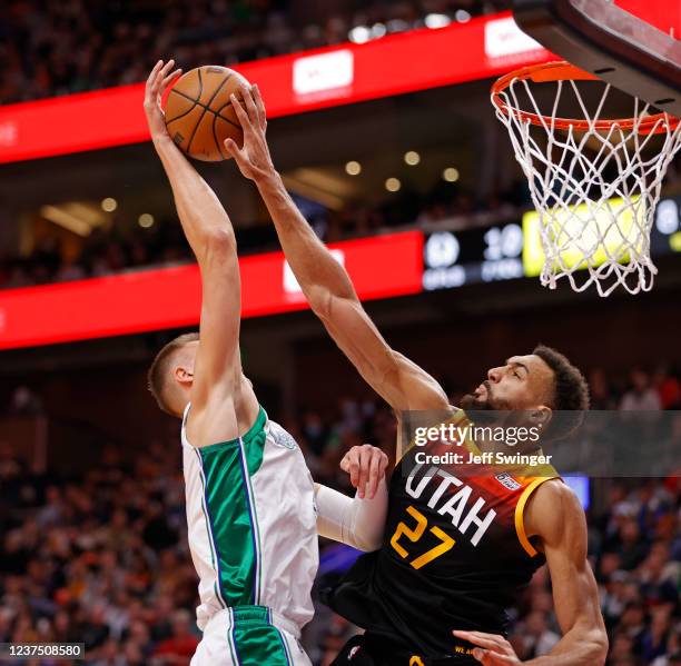 Rudy Gobert of the Utah Jazz blocks Kristaps Porzingis of the Dallas Mavericks on December 25, 2021 at Vivint Smart Home Arena in Salt Lake City,...