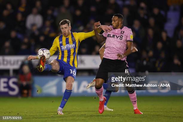 Josh Vela of Shrewsbury Town and Nathaniel Mendez-Laing of Sheffield Wednesday during the Sky Bet League One match between Shrewsbury Town and...
