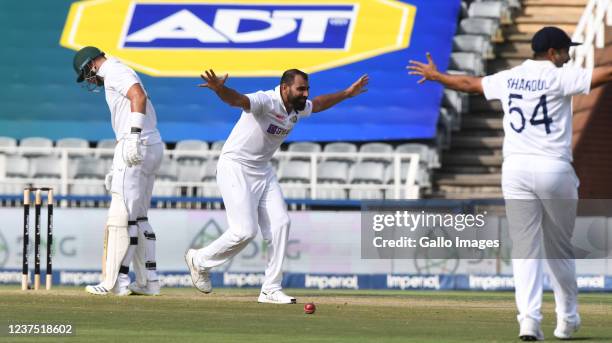 Mohd Shami of India celebrates with teammates his dismissal of Aiden Markram for seven runs during day 1 of the 2nd Betway WTC Test match between...