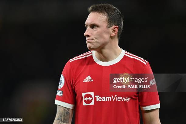 Manchester United's English defender Phil Jones looks on during the English Premier League football match between Manchester United and Wolverhampton...