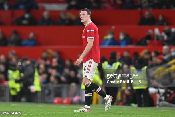 Manchester United's English defender Phil Jones looks on during the English Premier League football match between Manchester United and Wolverhampton...