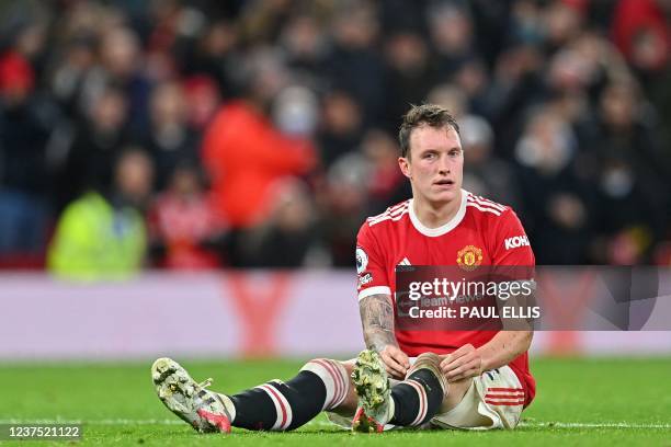 Manchester United's English defender Phil Jones reacts during the English Premier League football match between Manchester United and Wolverhampton...