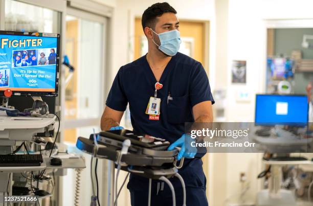 Registered nurse Fernando Fernandez is working in the ICU at at Martin Luther King Jr. Community Hospital on Friday, Dec. 31, 2021 in Los Angeles, CA.