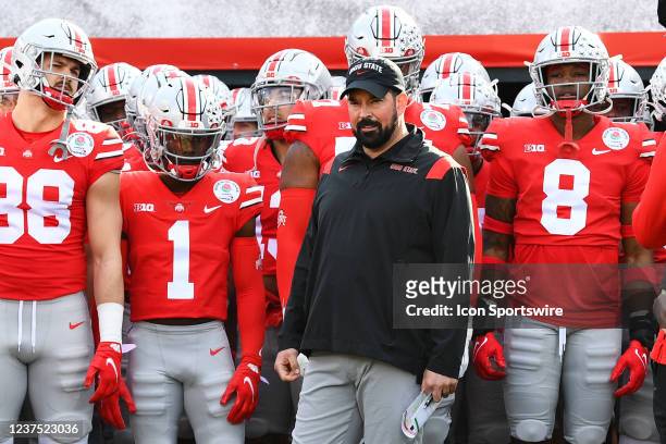 Ohio State Buckeyes head coach Ryan Day leads his team out to the field before the Rose Bowl game between the Ohio State Buckeyes and the Utah Utes...