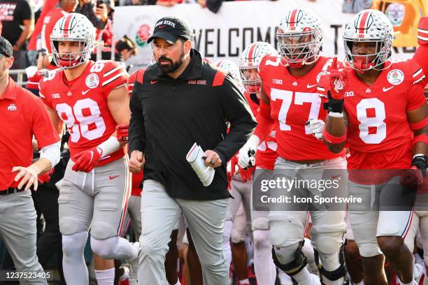 Ohio State Buckeyes head coach Ryan Day leads his team out to the field before the Rose Bowl game between the Ohio State Buckeyes and the Utah Utes...