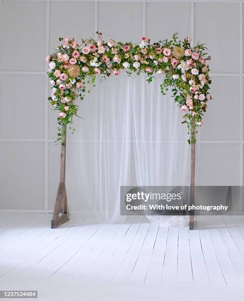 wedding floral decorations, flowers on wedding arch - wedding background stock pictures, royalty-free photos & images