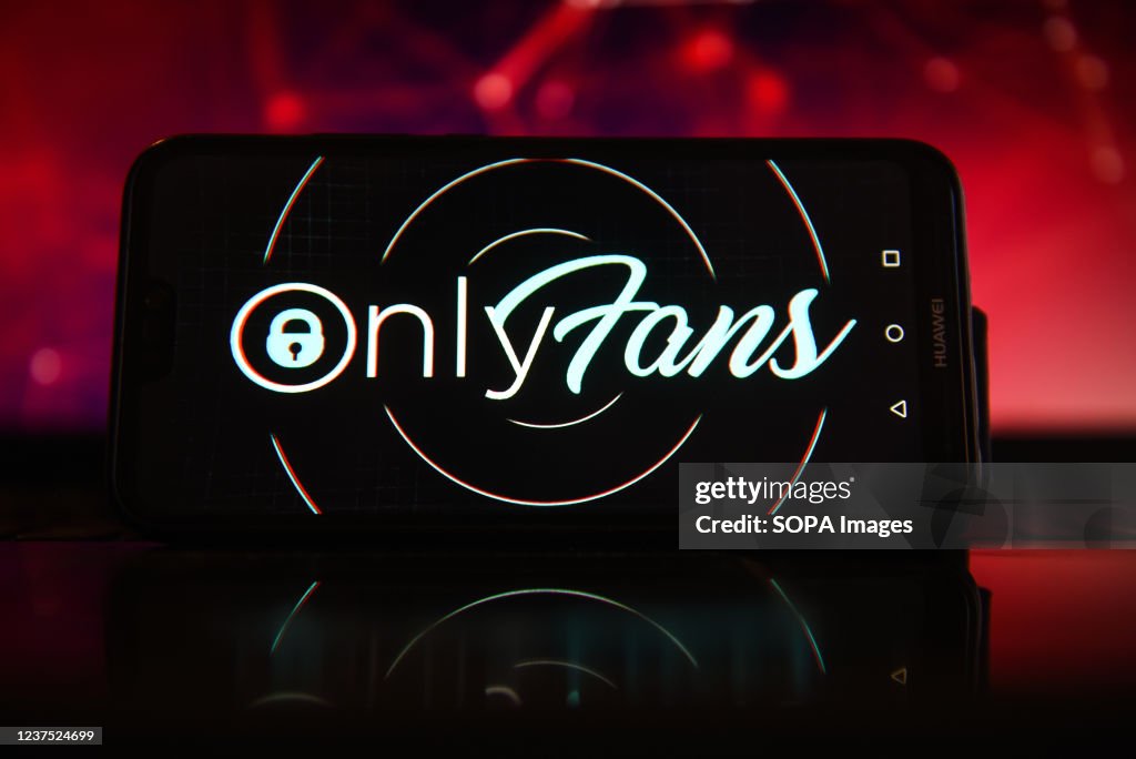 In this photo illustration the OnlyFans logo seen displayed...