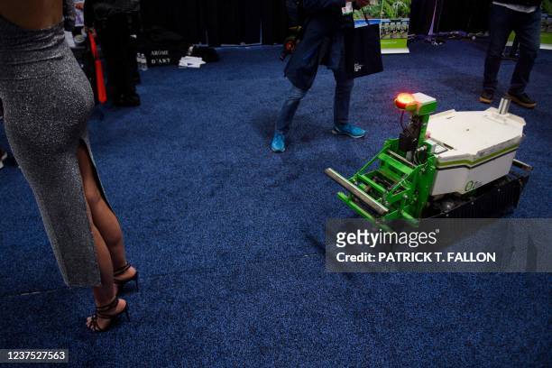 The Naio Technologies OZ440 autonomous agriculture robot for farming encounters human obstacles during CES Unveiled ahead of the Consumer Electronics...