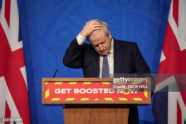 Britain's Prime Minister Boris Johnson speaks during a virtual press conference to update the nation on the status of the Covid-19 pandemic, in the...